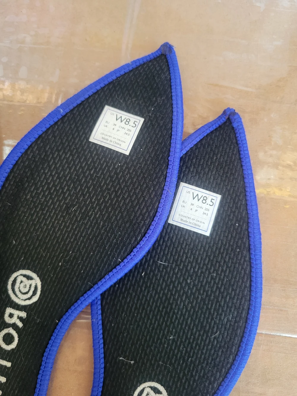 Rothy's Black Pointed Ballet Flat with Blue Trim